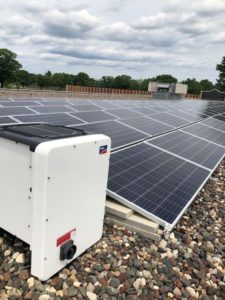 Solar panels on top of the Bloomgton facility building.