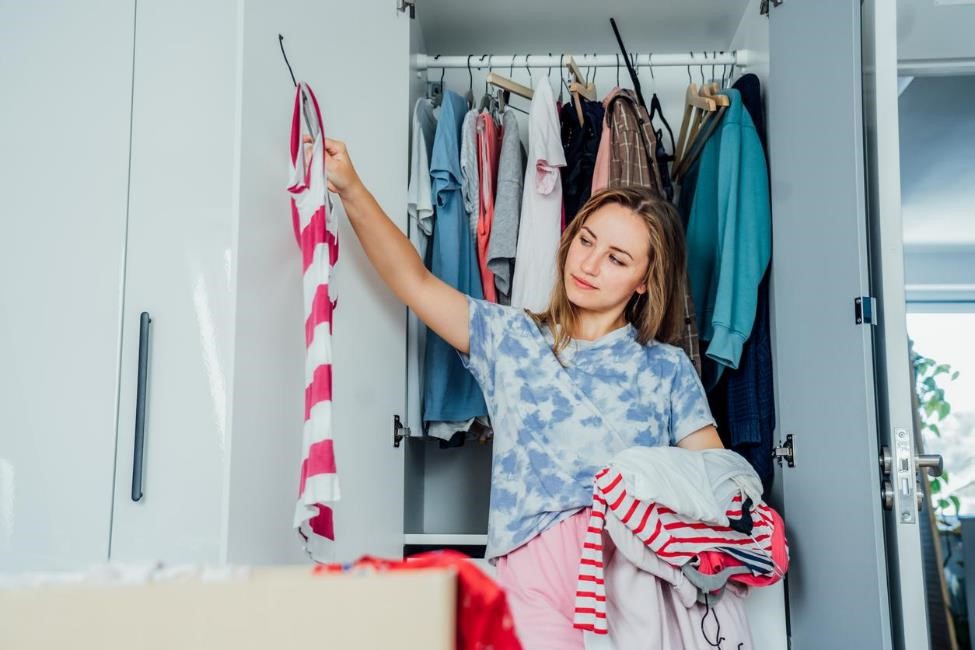 A woman organizing her closet