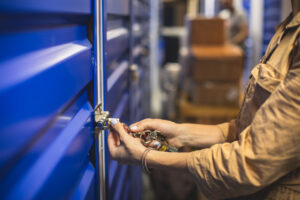 A woman opens up her 5x5 storage unit.