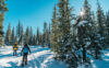 A couple goes snowshoeing through the Minnesota winter.