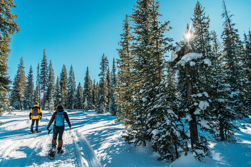 A couple goes snowshoeing through the Minnesota winter.