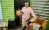 A man taking stock of his items intended for long-term storage.