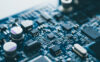 Computer board hardware motherboard microelectronics Server CPU chip semiconductor circuit core blue technology background or blue texture with processors concept electronic device